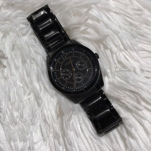 Black fossil watch with silver detail face